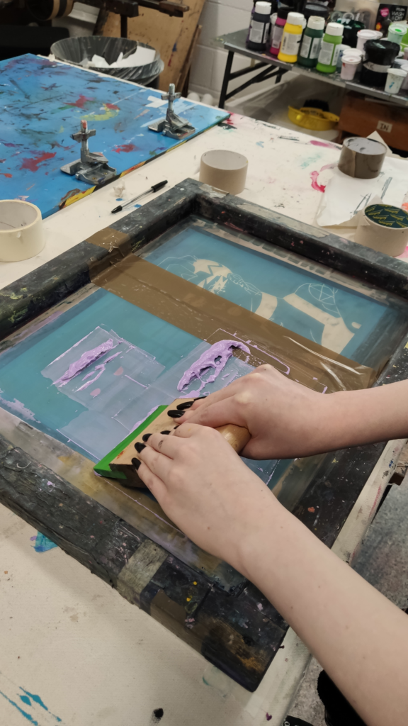 Close up of someones hands doing arts and crafts